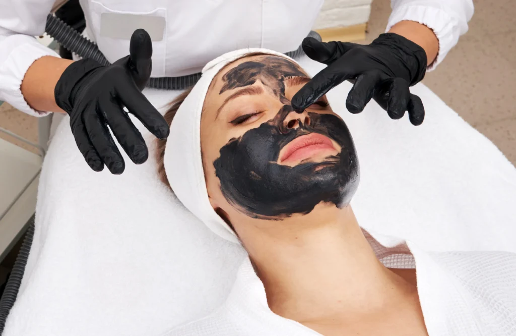 A Woman receiving facial treatments in Gig Harbor, WA at Haven Permanent Cosmetics & Aesthetics